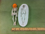 Skeleton with Pumpkin Head