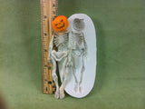 Skeleton with Pumpkin Head
